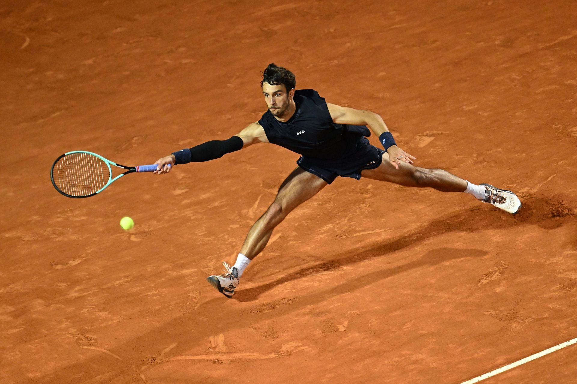 Lorenzo Musetti tracks down a ball at Italian Open 2025 | Image Source: Getty